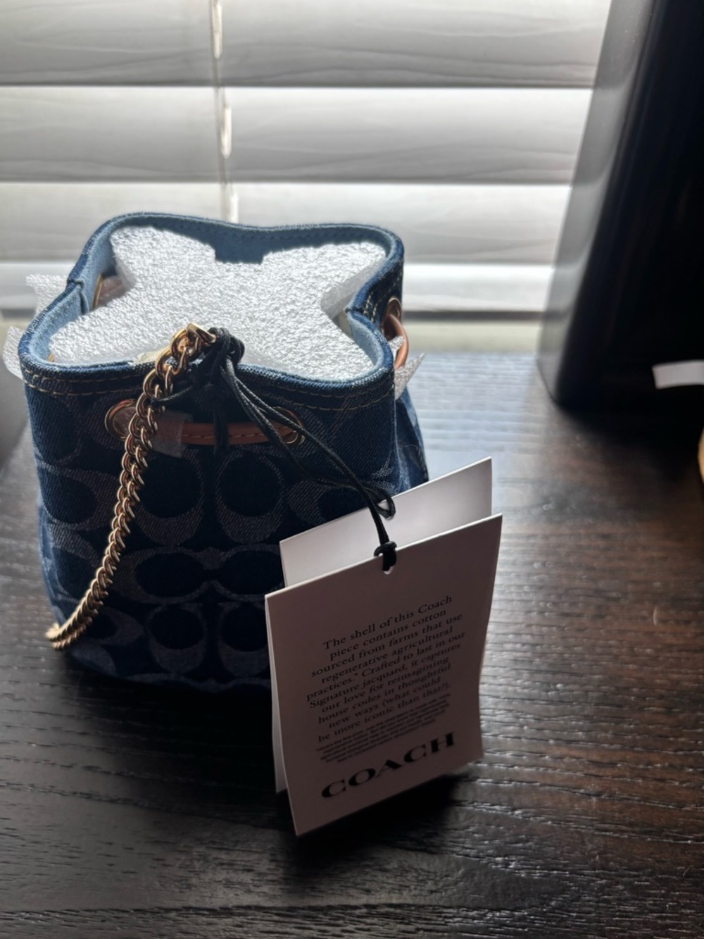 Coach Signature Denim Drawstring Wristlet
Navy Mini Bucket Bag with Gold Chain - Picture 4 of 10